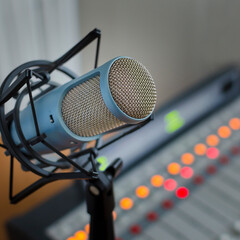 Professional microphone and sound mixer in radio station studio