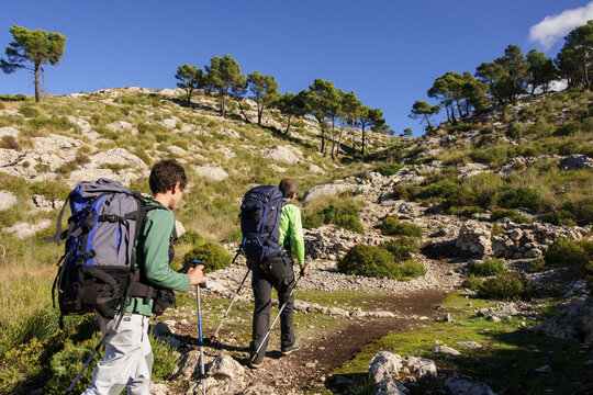 escursionista ascendiendo al Puig Galatzo , Estellencs, sierra de tramuntana, Mallorca. Islas Baleares. Spain.
