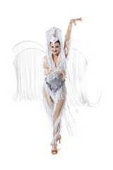 Dancing. Beautiful young woman in carnival, stylish masquerade costume with feathers dancing on white studio background. Concept of holidays celebration, festive time, dance, party, fashion