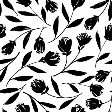 Black tulips vector seamless pattern. Hand drawn silhouettes of spring flowers, tulips, narcissus and iris. Dry brush style floral motives. Black paint illustration with abstract flowers