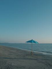 blue sea blue umbrella