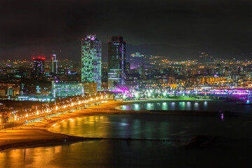 Picture of Barcelona from a high angle view taked at night.