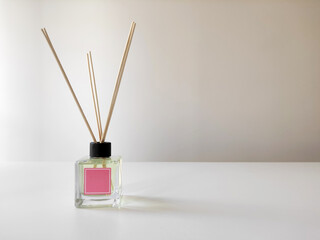 Room smell diffuser, aromatic reed air freshener on the table