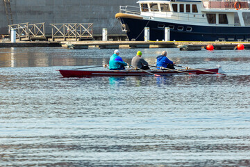 Old men rowing kayak