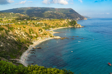 Fototapeta premium Beautiful panoramic view from Capo Vaticano over Grotticelle beach at sunset, Calabria, Italy