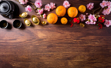 Top view for Happy Chinese new year or Lunar new year festival decorations on old wooden background. ( Chinese characters 