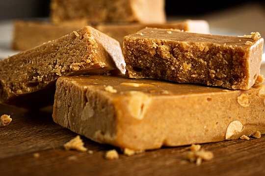 Pa&ccedil;oca, Closeup,  Brazilian Typical Peanut Candy on Wooden Table and a Plate