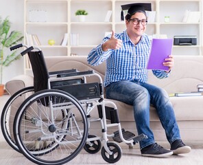 Young student on wheelchair in disability concept