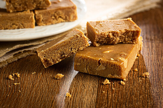 Pa&ccedil;oca, Brazilian Typical Peanut Candy on Wooden Table and a Plate