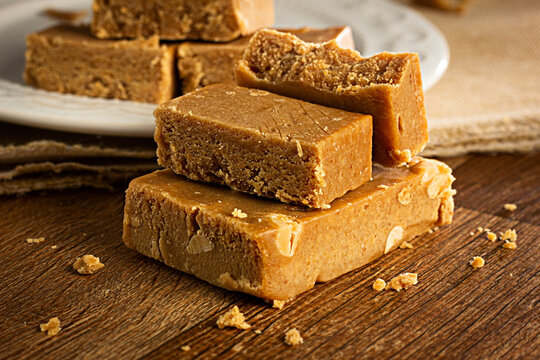 Pa&ccedil;oca ,Closeup,  Brazilian Typical Peanut Candy on Wooden Table and a Plate