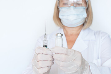Adult doctor, nurse, infectious disease scientist hand in white protective gloves holds the flu,...