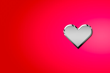 Silver metal heart shaped on red background. Clipping path.