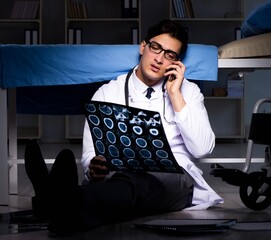 Doctor working night shift in hospital after long hours