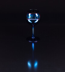 blue wine glasses isolated on black background