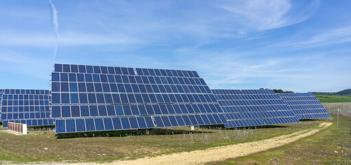 view of large solar energy panels in the countryside of Andalusia