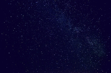 Obraz na płótnie Canvas Dark night sky Milky Way and stars on a dark background. Starry sky over Chelyabinsk region, Russia