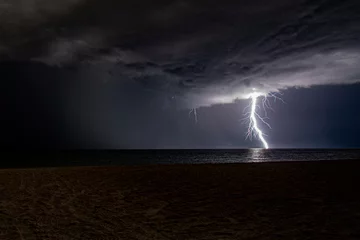 Fotobehang Lightning on the Beach, Ft. Myers © Eric Garner