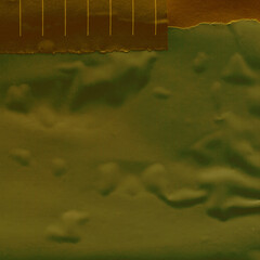 Colorful torn paper collage close-up. Texture made from various paper and cardboard parts. Damaged old paper background. Vintage blank wallpaper. Material design backdrop.