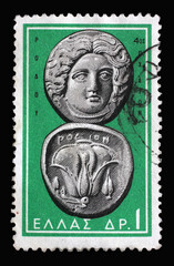 Stamp printed in Greece shows Helios (Sun) and Rose, Rhodes, 4th cent. B.C., Ancient Greek Coins, circa 1963