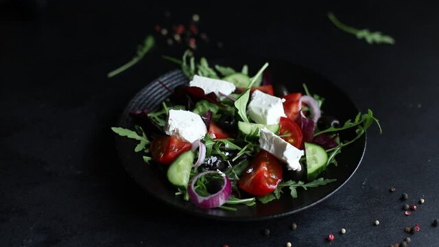 Greek salad vegetables and feta cheese ready to eat portion on the table for healthy meal snack outdoor top view copy space for text food background rustic image keto or paleo diet