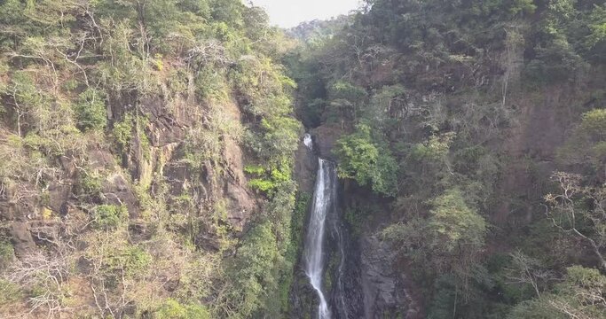 Breathtaking Cascades Of Mainapi Waterfall (Savri Waterfall) At Netravali Wildlife Sanctuary, South Goa, India. - Aerial Shot