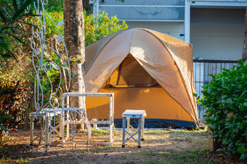 Brown tent with sunlight place in private house