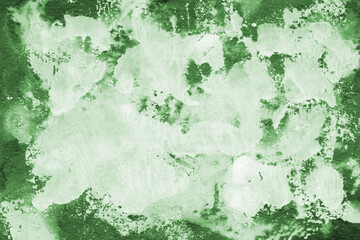 Green ink and watercolor texture on white paper background. Paint leaks and decalcomania effects. Hand-painted gouache abstract image. Mess on the canvas.