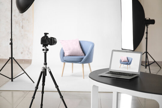 Interior of modern studio during photographing of furniture