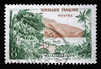 Stamp printed in the France shows Guadeloupe (River Sens), Tourism series, circa 1957