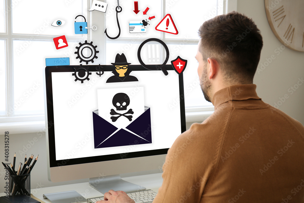 Poster young man with received infected email message on screen of computer at home