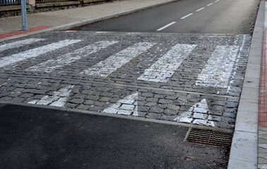 navigation tactile tiles strip for blind and disabled pedestrians who have vision problems. The red...