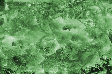 Green ink and watercolor texture on white paper background. Paint leaks and decalcomania effects. Hand-painted gouache abstract image. Mess on the canvas.