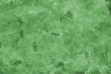 Green ink and watercolor texture on white paper background. Paint leaks and decalcomania effects. Hand-painted gouache abstract image. Mess on the canvas.