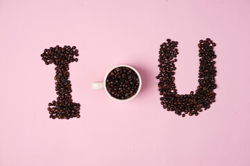 Handcrafted arrangement of coffee beans shaped to resemble a heart, symbol of love to commemorate...
