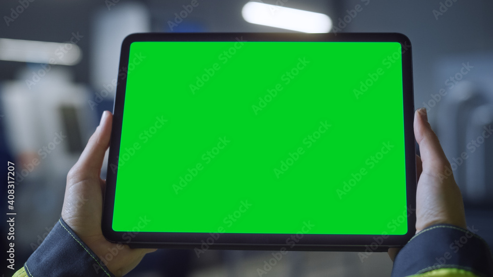 Poster Industry 4.0 Factory: Chief Engineer and Project Supervisor Holds Digital Tablet Computer with Green Screen, Chroma Key. Workshop with Machinery.