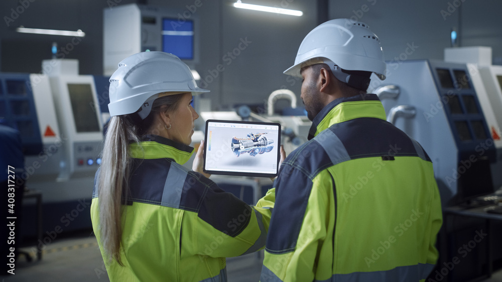 Poster Industry 4.0 Factory: Chief Engineer and Project Supervisor in Safety Vests and Hard Hats, Talk, Use Digital Tablet Computer, Screen Shows 3D Concept of New Engine. Workshop with Machinery.