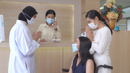 Asian Doctor and patient health care medical check sickness