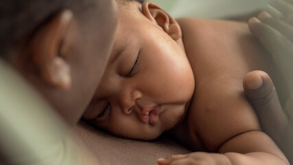 African man with his little baby