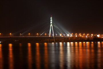 Fototapeta na wymiar Moscow bridge in Kiev at night. Kiev city skyline