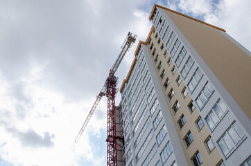 Fototapeta premium Construction of a high-rise residential building