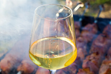 Georgian white wine and wineglass 