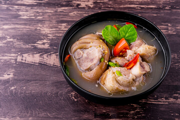 Spicy soup with pork leg