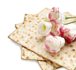 Jewish flatbread matza for Passover and flowers on white background