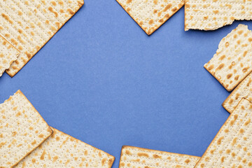 Jewish flatbread matza for Passover on color background