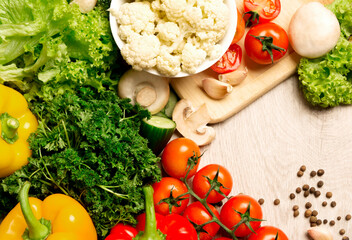 top view of a set of vegetables on a light background
