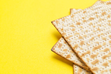 Jewish flatbread matza for Passover on color background