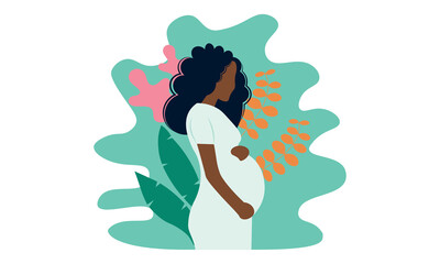 Young beautiful pregnant black woman in nature. Concept for pregnancy, motherhood.
