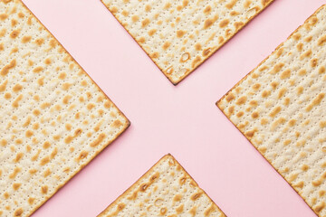 Jewish flatbread matza for Passover on color background