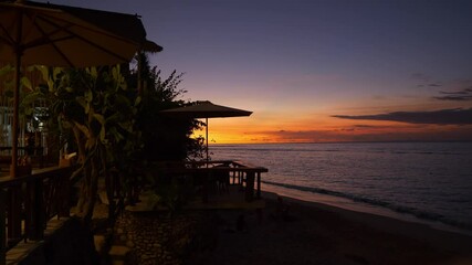 sunset sky bali island jimbaran area famous cozy beach bay cafe terrace panorama 4k indonesia