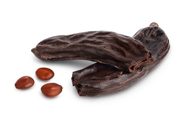 Ripe carob pods and bean isolated on white background with clipping path and full depth of field